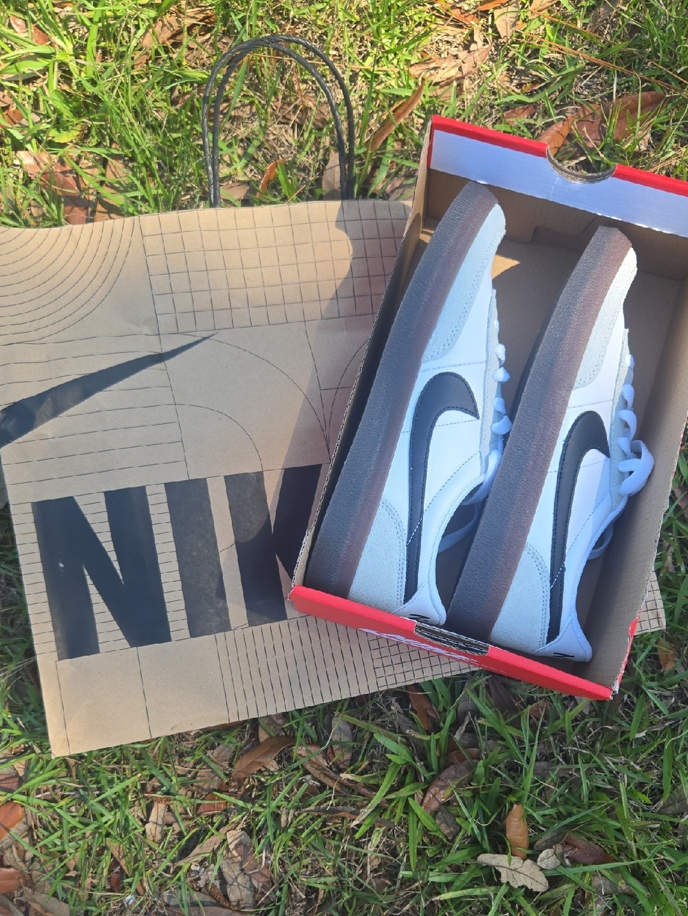 Nike Kids White Sneakers with Gray Swoosh